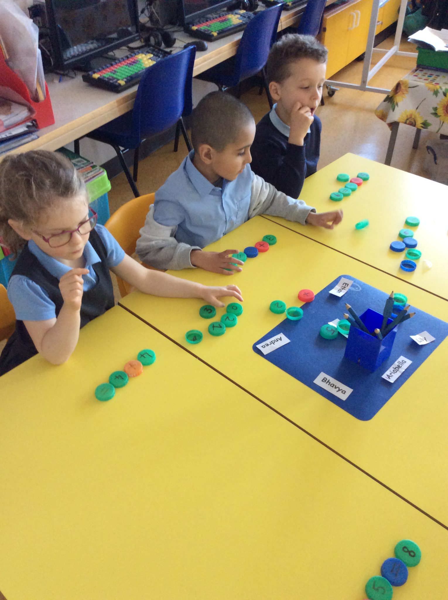 Maths fun using milk bottle tops really! Hanover Street School, Aberdeen